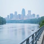 Edmonton skyline and North Saskatchewan River under a light haze, representing current low-risk air quality conditions.